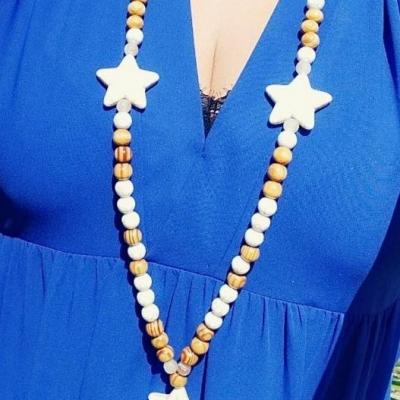 Sautoir perles et pendentif étoile et ses plumes.